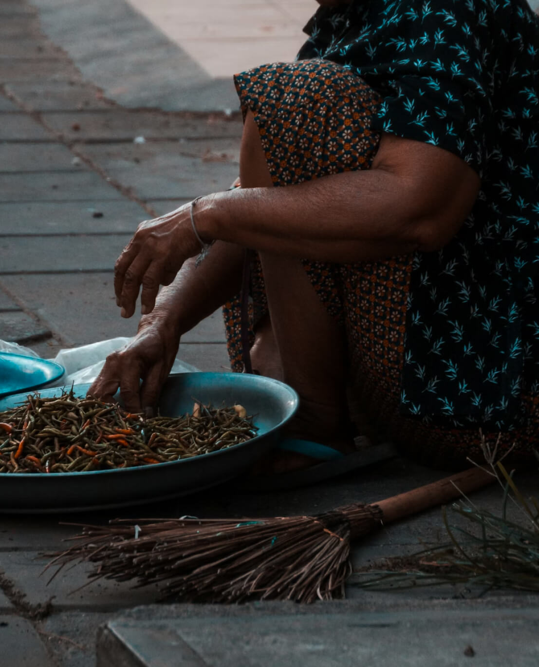 Experienced hands stirring a pot — generations of culinary tradition